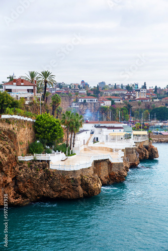 Fototapeta Naklejka Na Ścianę i Meble -  The old port of Antalya - Antalya Kaleici Yat Limani. With yachts, boats. and old buildings. View from above. Antalya, Turkiye.
