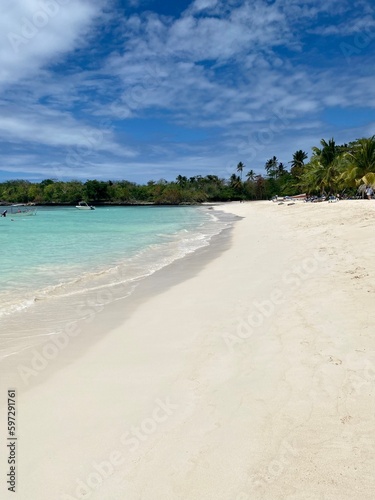 Fototapeta Naklejka Na Ścianę i Meble -  beautiful white sand and turquise water beach in La Playita, Las Galeras, Samana, Dominica Republic