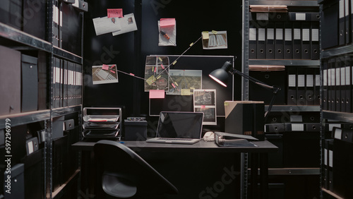 Criminal evidence board in private investigation office, map on wall filled with crime scene photos and clues. Police archive room with background check papers and forensic evidence.