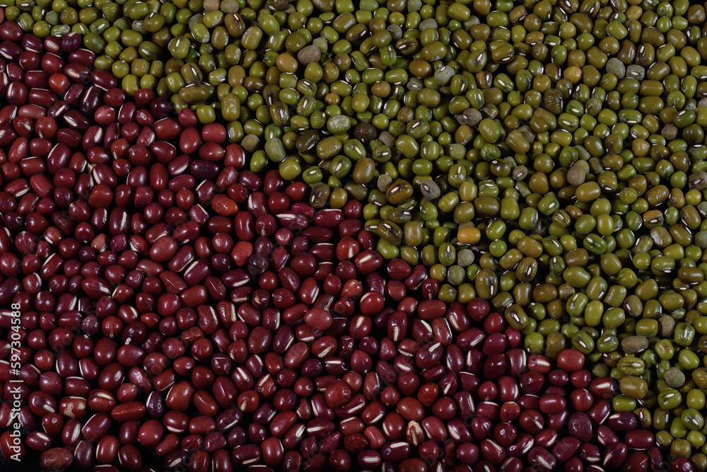 Red and green soya beans filling the image, divided diagonally Red and green soya beans filling the image, divided diagonally