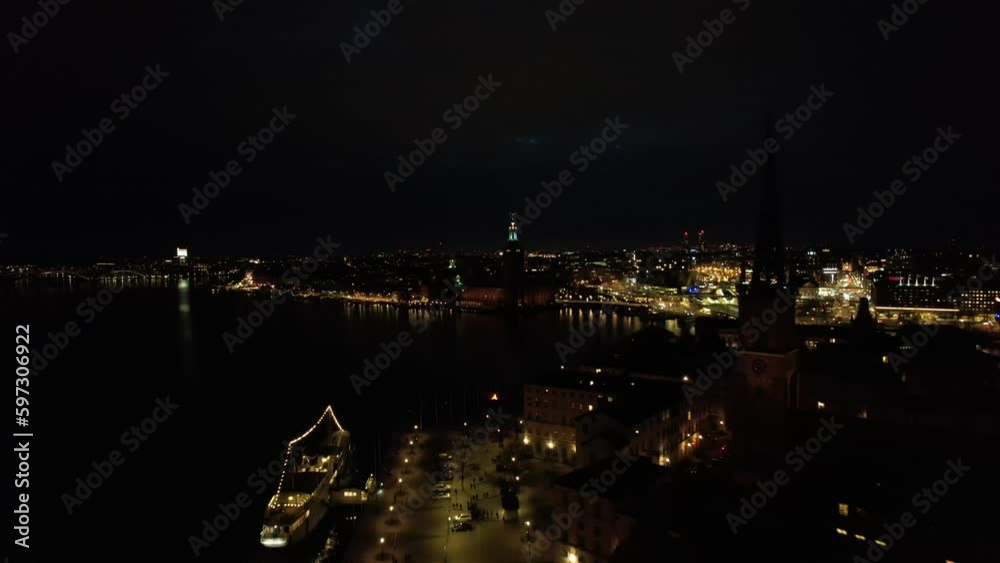 Beautiful aerial shot of illuminated buildings in the city at night Beautiful aerial shot of illuminated buildings in the city at night