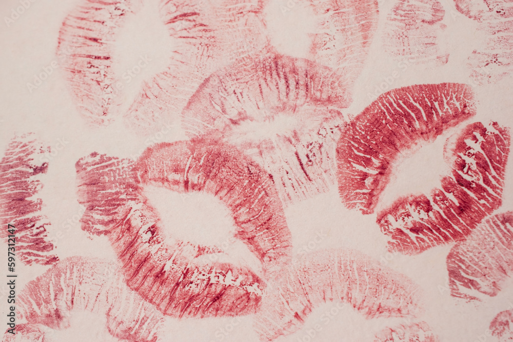Red lipstick imprints on white paper, kiss, beautiful red lips - obrazy, fototapety, plakaty 