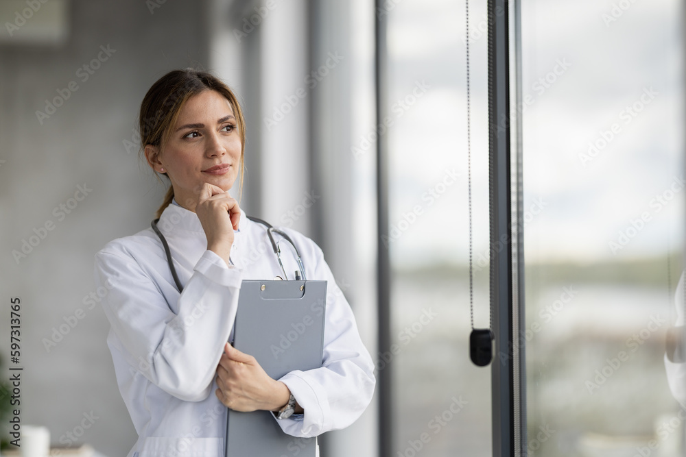 Portrait of female doctor in her office