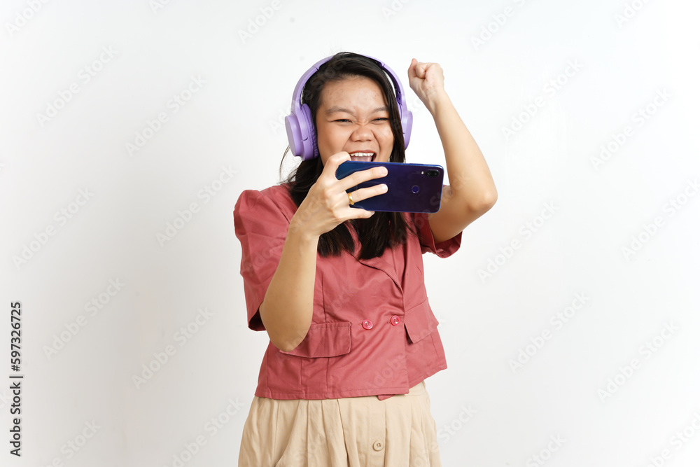 Playing Mobile Game on Smartphone with Headphone Of Beautiful Asian Woman Isolated On White