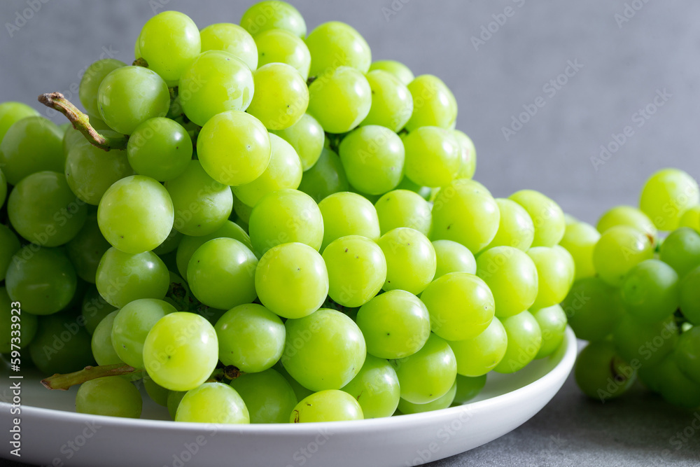 Shine Muscat, Green grapes on marble background Shine Muscat, Green grapes on marble background