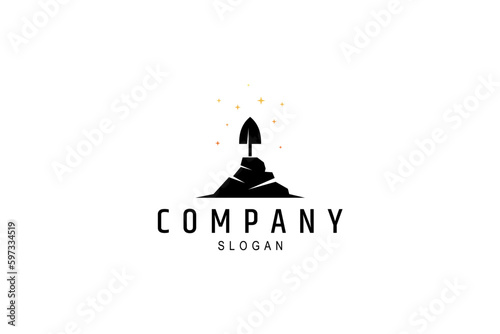 shovel silhouette on stone decorated with stars in flat logo design