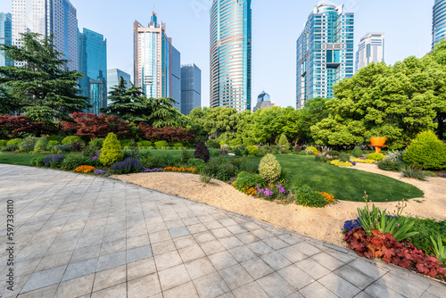 Canvas Print shanghai city skyline with green lawn