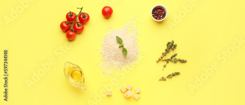 Fototapeta Naklejka Na Ścianę i Meble -  Raw ingredients for risotto on yellow background