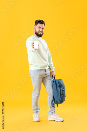 Young bearded man with back...