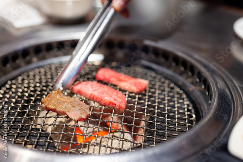Japanese style meat barbecue at restaurant photo