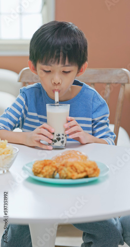 asian boy eat unhealthy food