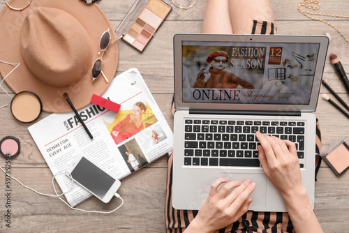 Woman with laptop, makeup p...