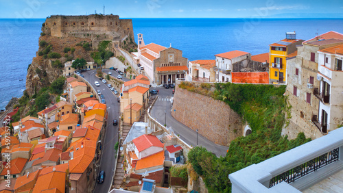 Scenic view with Ruffo castle in Scilla town, old town and blue sea on horizon. Calabria region, Italy.