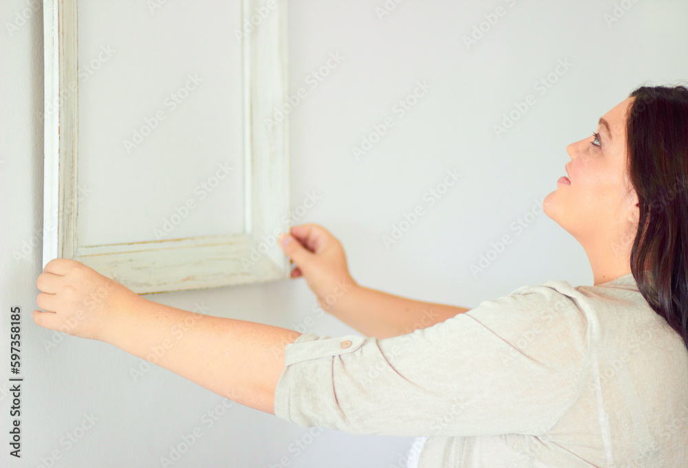 Wall, frame and decoration with woman and hanging for diy, maintenance and construction. Home improvement, planning and interior design with female handyman for construction, creative and picture Wall, frame and decoration with woman and hanging for diy, maintenance and construction. Home improvement, planning and interior design with female handyman for construction, creative and picture