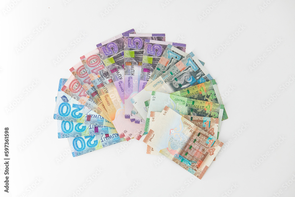 Selective focused , Full set of Kuwaiti Dinar bank paper notes. Kuwait dinar bank notes 0.25KWD, 0.5KWD, 1KWD, 5KWD, 10 KWD and 20 KWD. Kid trying to take the Kuwait dinar bank notes Selective focused , Full set of Kuwaiti Dinar bank paper notes. Kuwait dinar bank notes 0.25KWD, 0.5KWD, 1KWD, 5KWD, 10 KWD and 20 KWD. Kid trying to take the Kuwait dinar bank notes