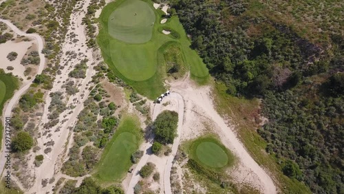 4K Aerial shot of Golf Green at Rustic Canyon Golf Course in Moorpark California on a warm sunny day photo