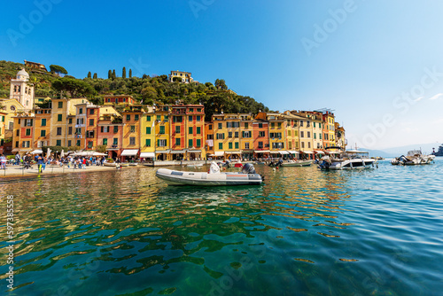Port of the famous village of Portofino, luxury tourist resort in Genoa Province, Liguria, Italy, Europe. Colorful houses, Mediterranean sea (Ligurian sea).