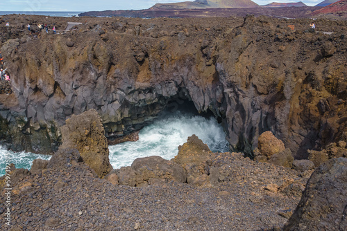 Cliffs of Los Hervideros in Lanzarote. Canary Islands. Spain photo