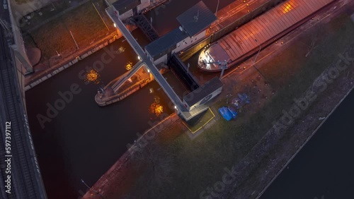 Time lapse drone point of view barge moving through Neckar lock, Stuttgart, Germany
