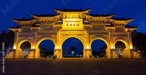 The main gate of Chiang Kai Shek memorial hall in twilight. the chinese words on it mean 