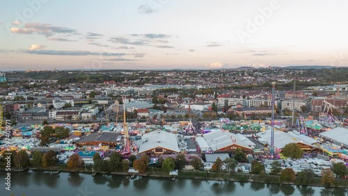 Time lapse amusement park along river, Wasen District, Stuttgart, Germany
