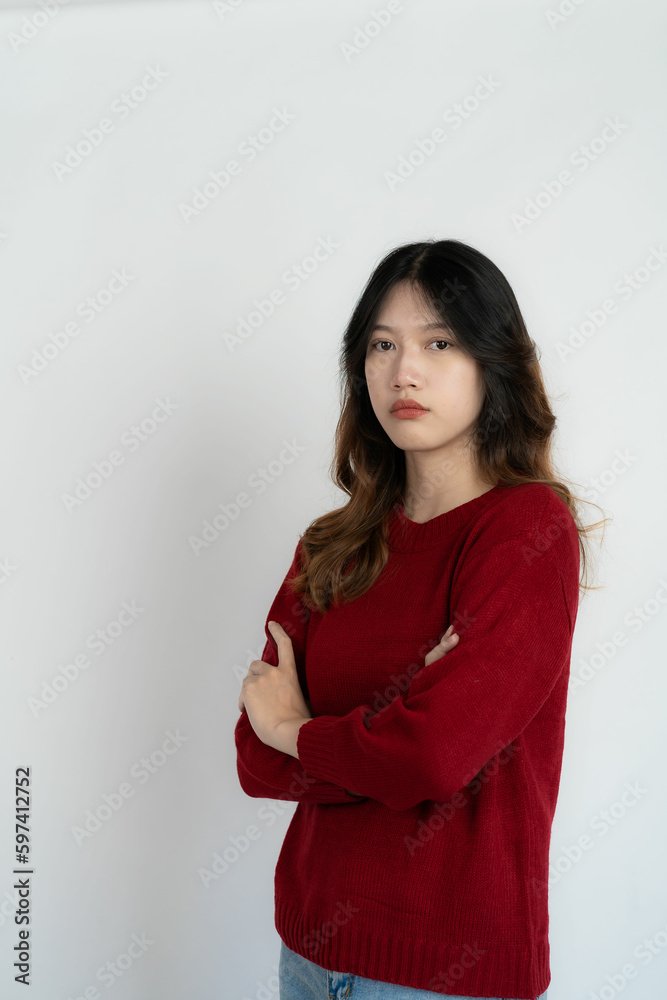 Attractive Asian beautiful woman standing on white background and doing hand gestures. Attractive Asian beautiful woman standing on white background and doing hand gestures.