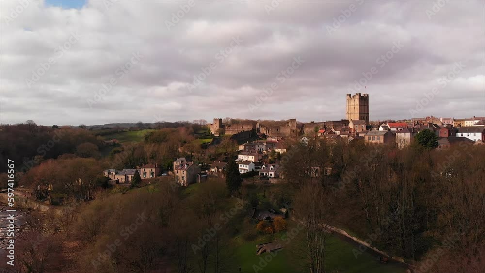 DRONE english medieval village with river and castle DRONE english medieval village with river and castle