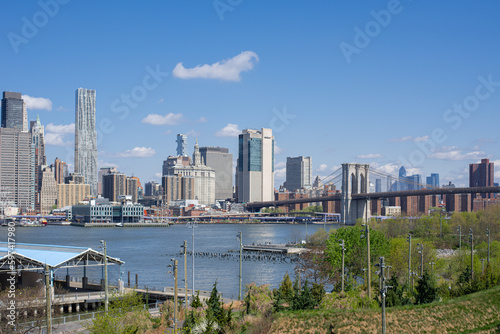 panorama of Manhattan and brooklyn bridge across the East River from Brooklyn © Alevtina