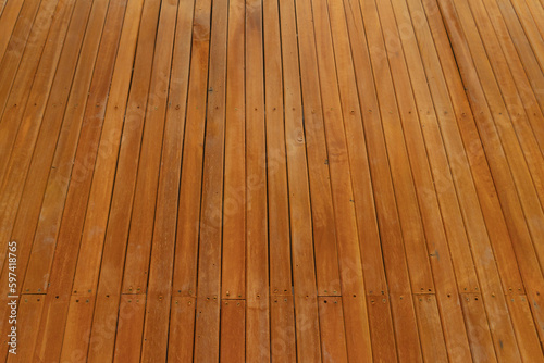 Natural wood slats wall or lath line arrange. Flooring pattern surface texture. Close-up of interior architecture material for design decoration background.