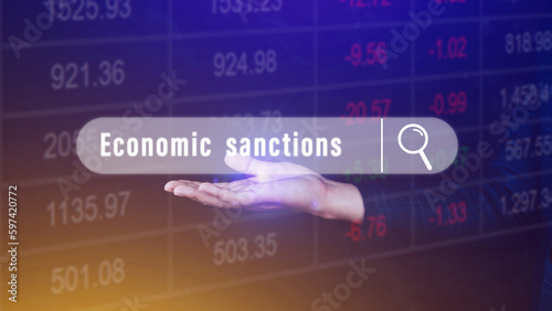 Economic sanctions, written in search bar with the financial data visible in the background. Reports Stock Market Ticker Words photo