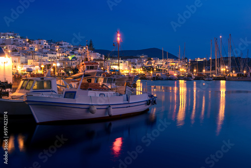 Beautiful Greek fishermen village on hilltop and by waterfront after