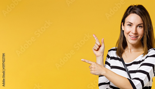 Directing Your Attention Excited Woman in Striped Shirt Pointing to Copy Space Perfect for E-commerce, Online Sales, Advertising,and Promotion, Marketing, Advertising, Product Promotion. Generative AI