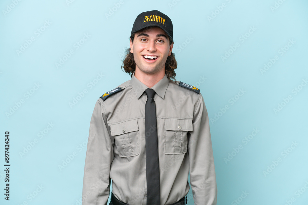 Young safeguard man isolated on blue background with surprise facial expression Young safeguard man isolated on blue background with surprise facial expression