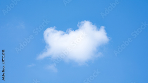 blue sky with heart shaped cloud background.