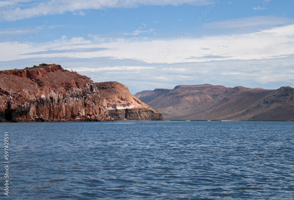 Red rocks of the protected biosphere reserve on Espiritu Santo Island in Baja California Sur, Mexico. 