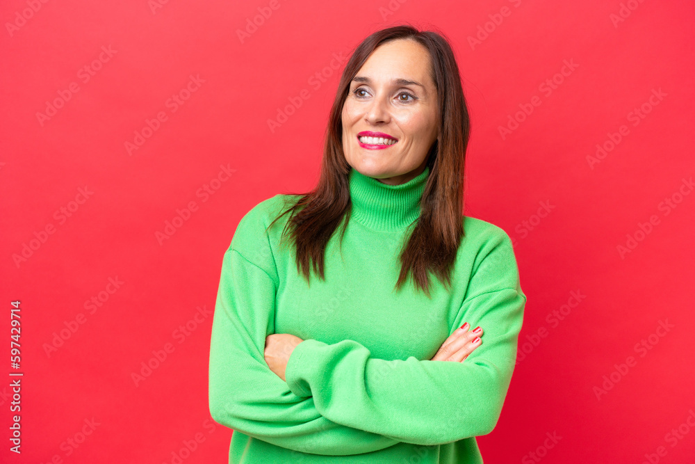 Middle-aged caucasian woman isolated on red background happy and smiling Middle-aged caucasian woman isolated on red background happy and smiling