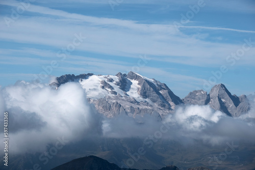 Marmolada glacier and low clouds in the Italian Dolomites