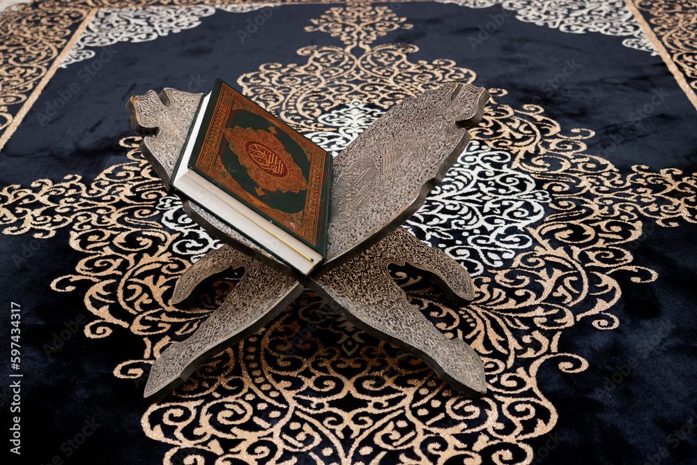 Φωτογραφία muslim book with Arabic calligraphy Quran translation :  holy book of Muslims  o