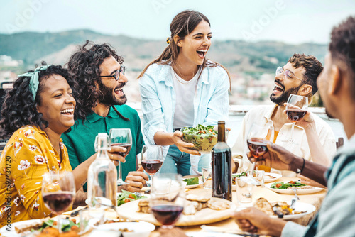 Photography Happy friends dining and drinking red wine glasses on balcony rooftop party - Yo