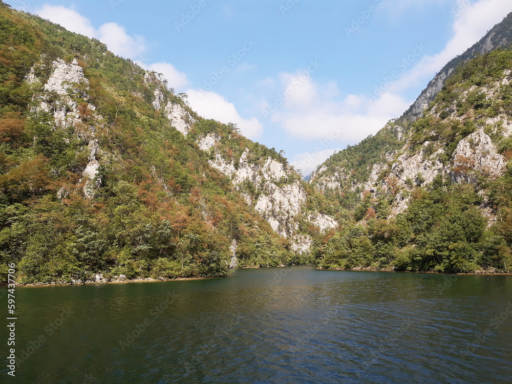 banks of river Drina with cloudy sky