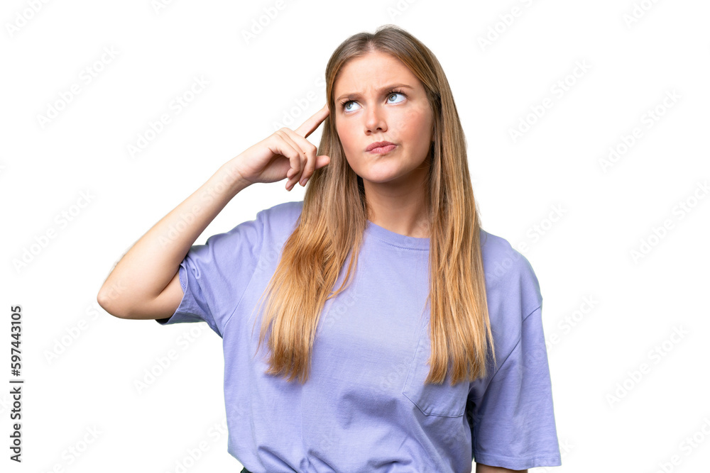 Young beautiful woman over isolated background making the gesture of madness putting finger on the head Young beautiful woman over isolated background making the gesture of madness putting finger on the head