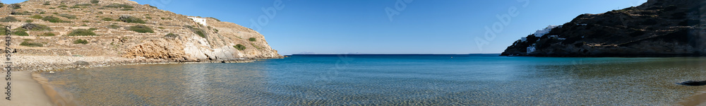 Real panoramic view of the stunning turquoise sandy beach of Kolitsani in Ios Cyclades Greece Real panoramic view of the stunning turquoise sandy beach of Kolitsani in Ios Cyclades Greece