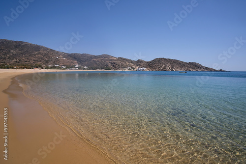 Fototapeta Naklejka Na Ścianę i Meble -  View of the beautiful turquoise sandy beach of Mylopotas in Ios Greece