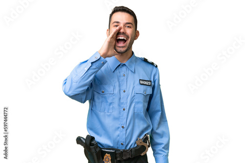 Young police caucasian man over isolated background shouting with mouth wide open