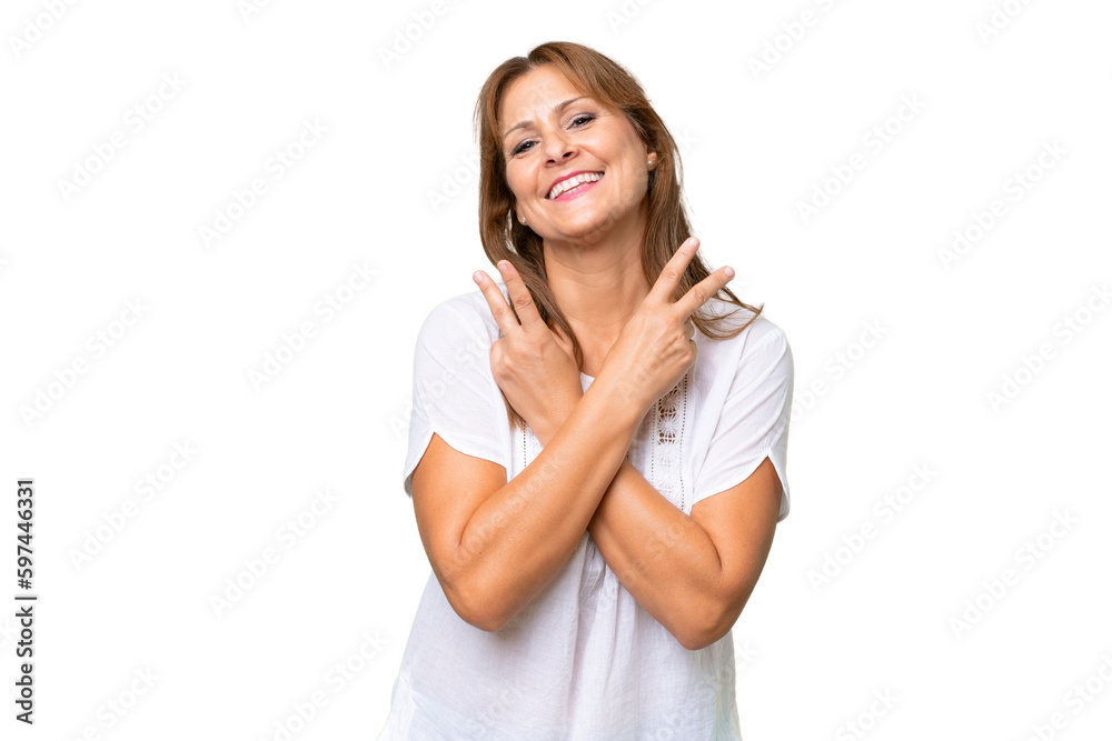 Middle-aged caucasian woman over isolated background smiling and showing victory sign Middle-aged caucasian woman over isolated background smiling and showing victory sign