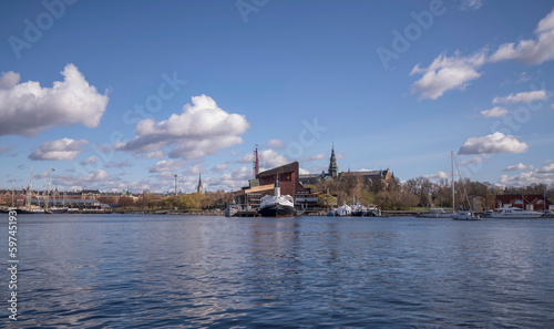 Panorama over the bay Ladugårdsviken, in background the maritime museum boats and the Vasa museum, a sunny spring day with cumulus clouds in Stockholm © Hans Baath
