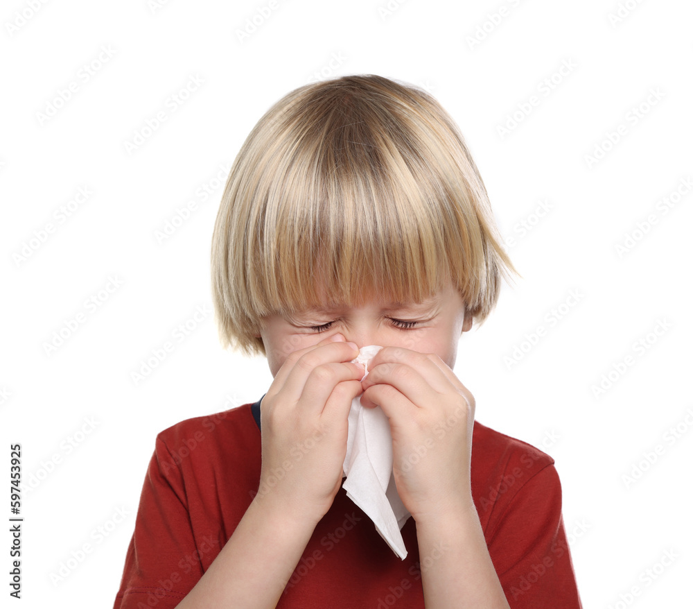 Boy blowing nose in tissue on white background. Cold symptoms Boy blowing nose in tissue on white background. Cold symptoms