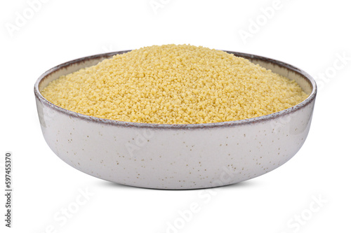 Bowl of raw couscous isolated on white photo