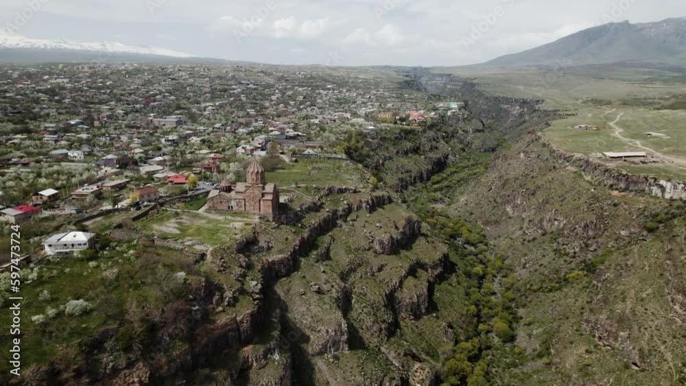 Aerial view of armenian monastery Hovhannavank and the village Ohanavank with blossoming trees Aerial view of armenian monastery Hovhannavank and the village Ohanavank with blossoming trees