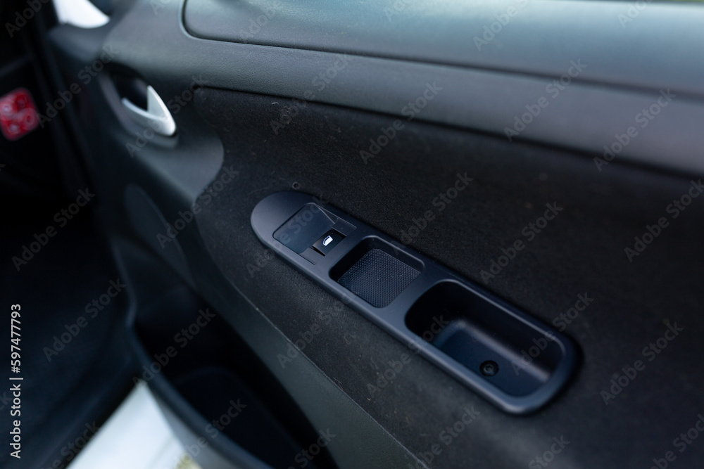 power window and lock control buttons on the car door